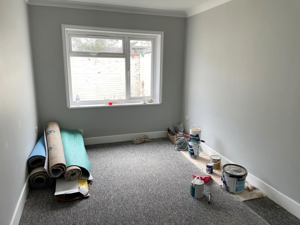 Lot: 19 - FREEHOLD HOUSE ARRANGED AS THREE FLATS IN CENTRAL WORTHING - View of main bedroom to rear overlooking patio